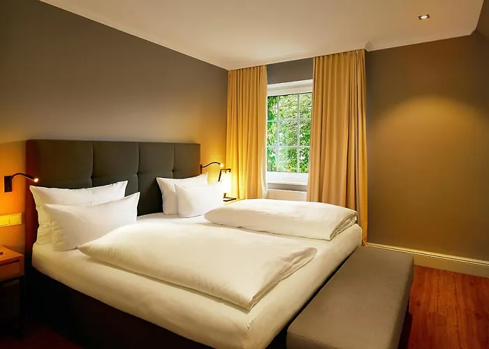 Fuchsbau Romantik & Restaurant & Fox Bar 酒店 蒂门多弗施特兰德